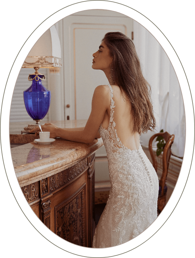 Photo of the model posing near the desk