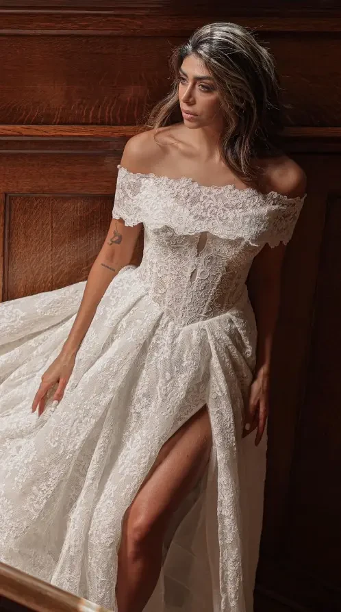 Photo of the model wearing a white gown